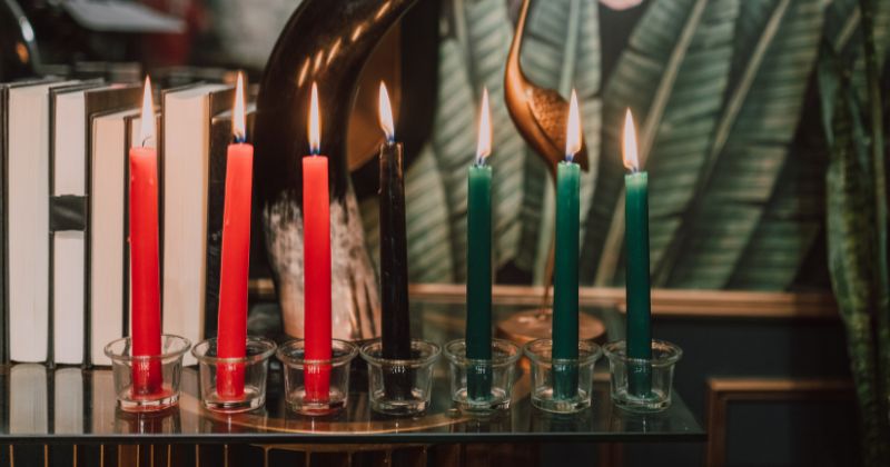 Lighted candle on a table for easy home heating.