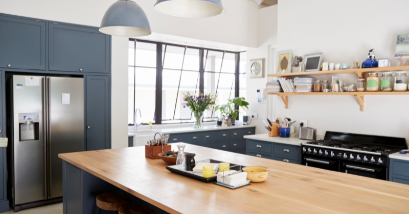 A stylishly designed kitchen showcasing integrated kitchen heating solutions.