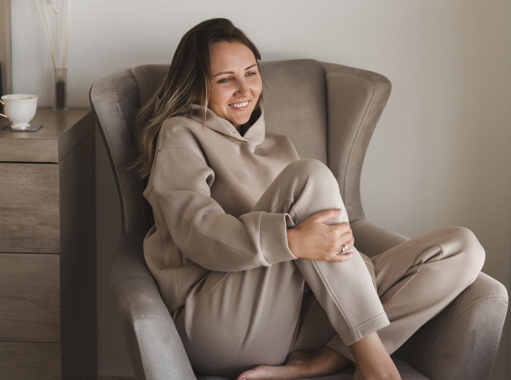 woman feeling comfortable sitting on a coach