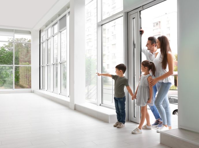 family viewing their home